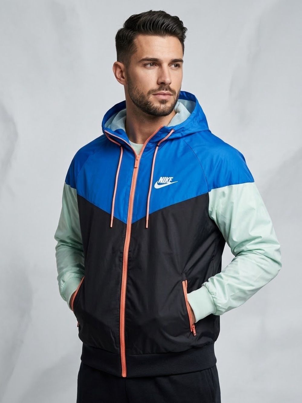 Nike Men’s Blue/Black/Mint Hooded Windbreaker with Coral Accents